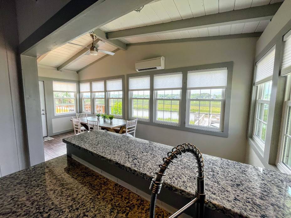 Wash dishes while enjoying a view of the marsh. Wash dishes while enjoying a view of the marsh.