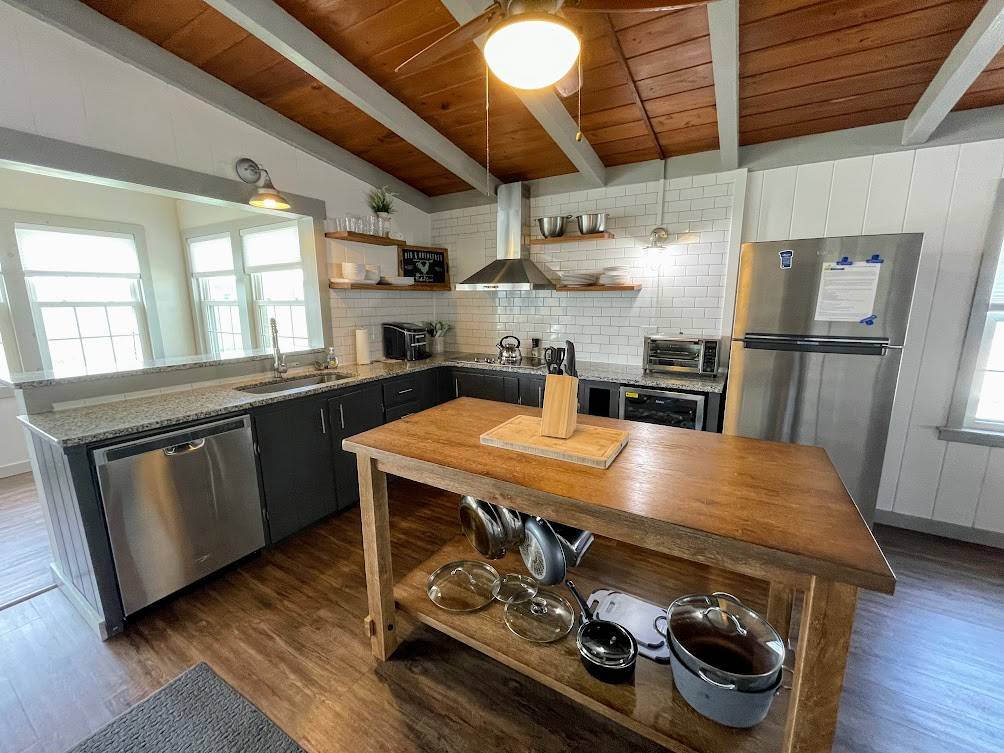 Kitchen with cooktop, convection toaster over, dishwasher and microwave Kitchen with cooktop, convection toaster over, dishwasher and microwave