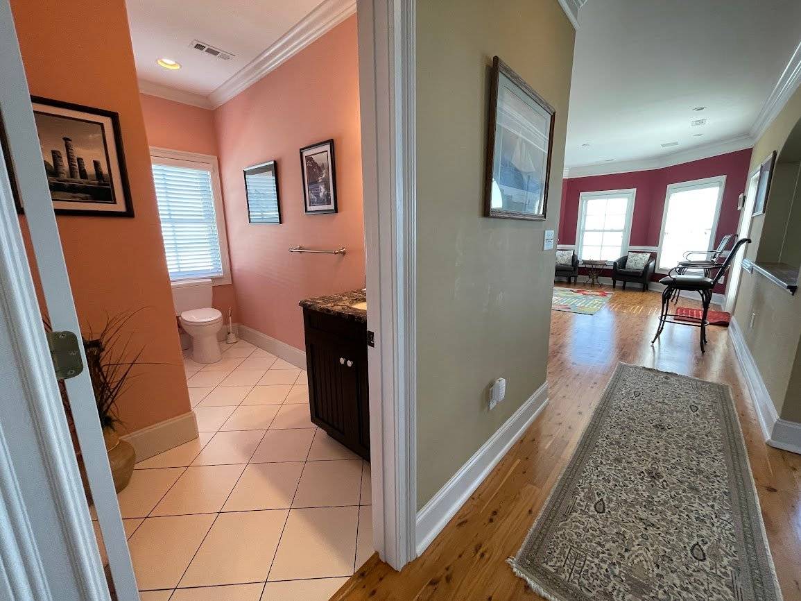 Hall entry to Bath shared with Bedroom 5 and to Lounge Hall entry to Bath shared with Bedroom 5 and to Lounge