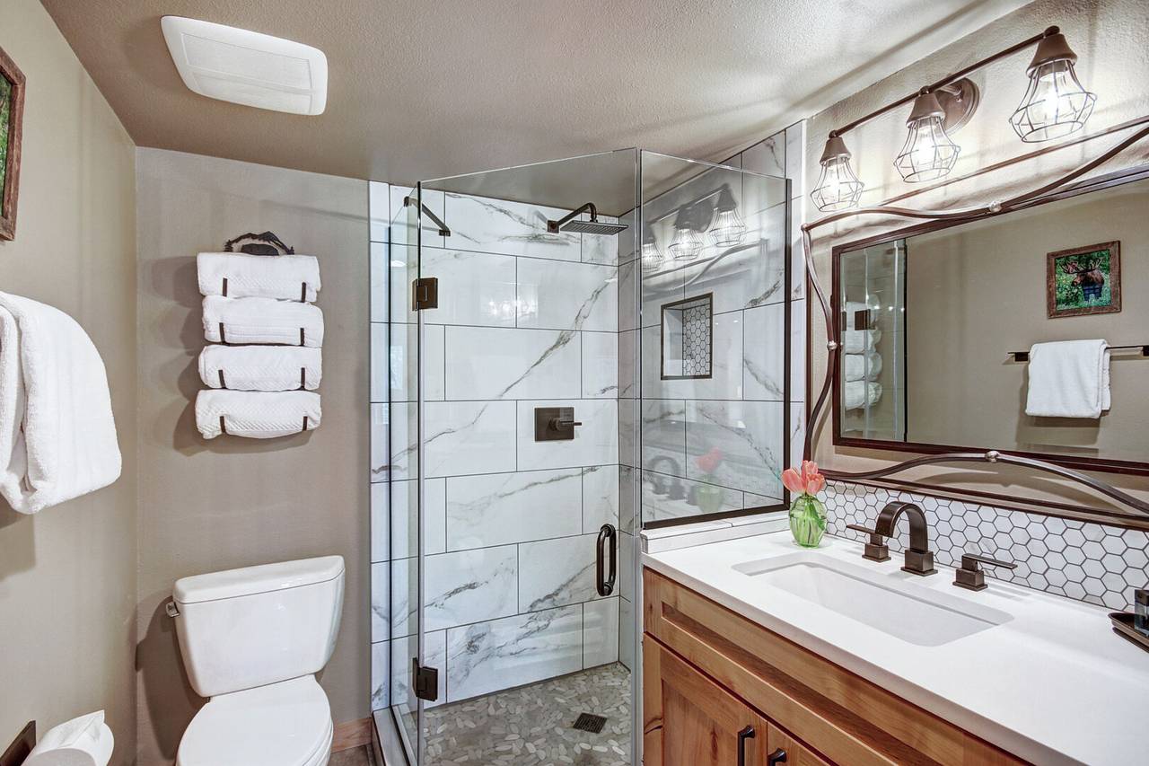 Newly renovated private bath in main level master with walk-in shower and 1 sink - Atrium 108 Breckenridge Vacation Rental Newly renovated private bath in main level master with walk-in shower and 1 sink - Atrium 108 Breckenridge Vacation Rental