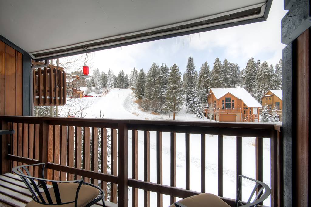 Watch skiers on the slopes from the private deck - 4 O'Clock Lodge D26 Breckenridge Vacation Rental Watch skiers on the slopes from the private deck - 4 O'Clock Lodge D26 Breckenridge Vacation Rental