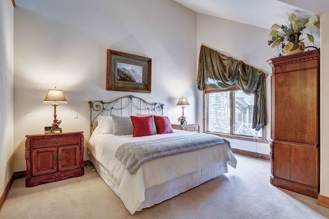 Primary bedroom with natural light and vaulted ceilings - Amber Sky Breckenridge Vacation Rental Primary bedroom with natural light and vaulted ceilings - Amber Sky Breckenridge Vacation Rental