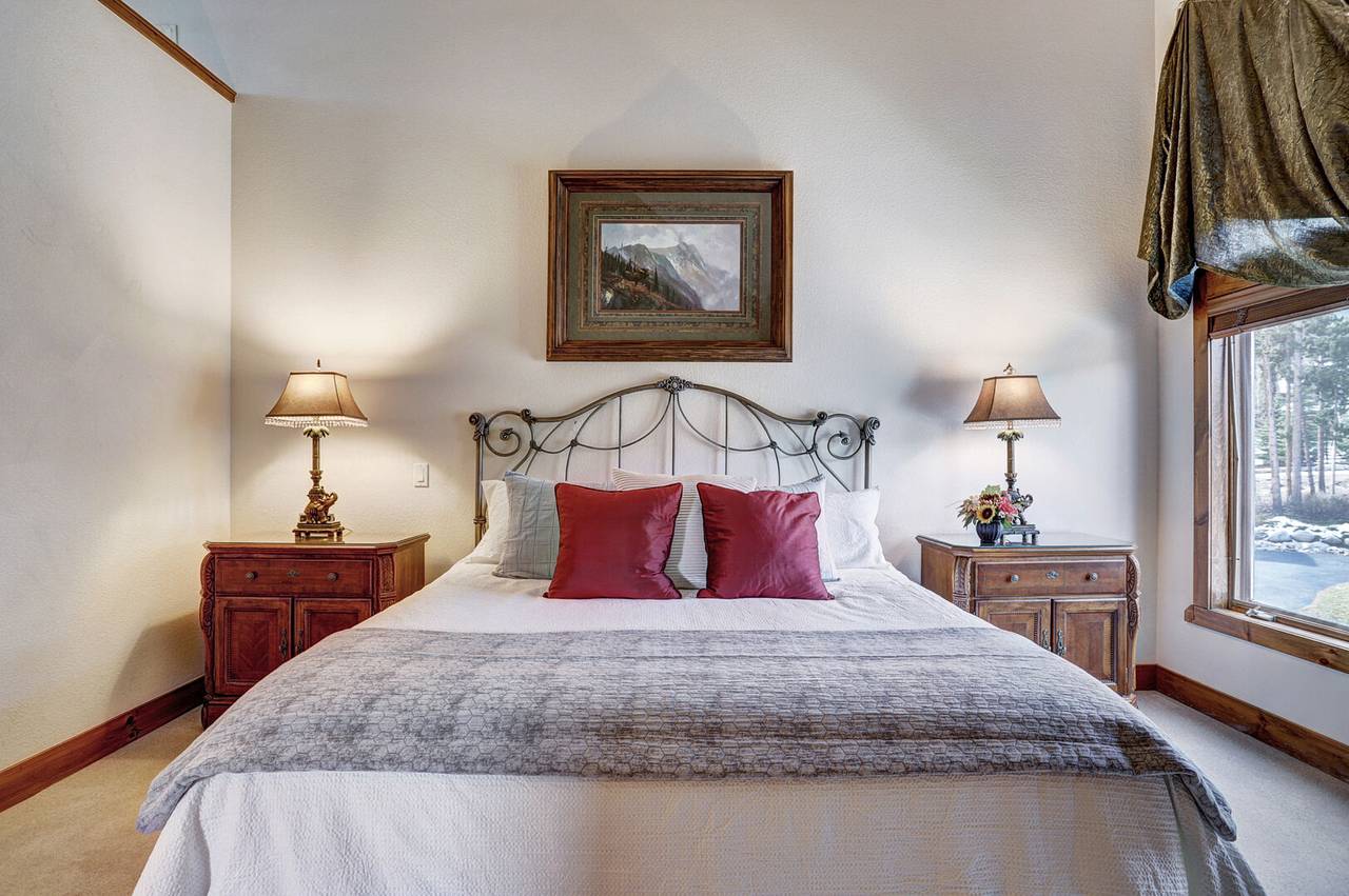 Relax and get cozy after a long day in this primary bedroom - Amber Sky Breckenridge Vacation Rental Relax and get cozy after a long day in this primary bedroom - Amber Sky Breckenridge Vacation Rental