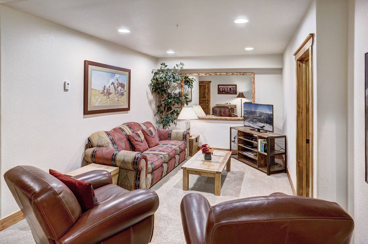 Watch a movie with friends and family in this lower level living space - Amber Sky Breckenridge Vacation Rental Watch a movie with friends and family in this lower level living space - Amber Sky Breckenridge Vacation Rental