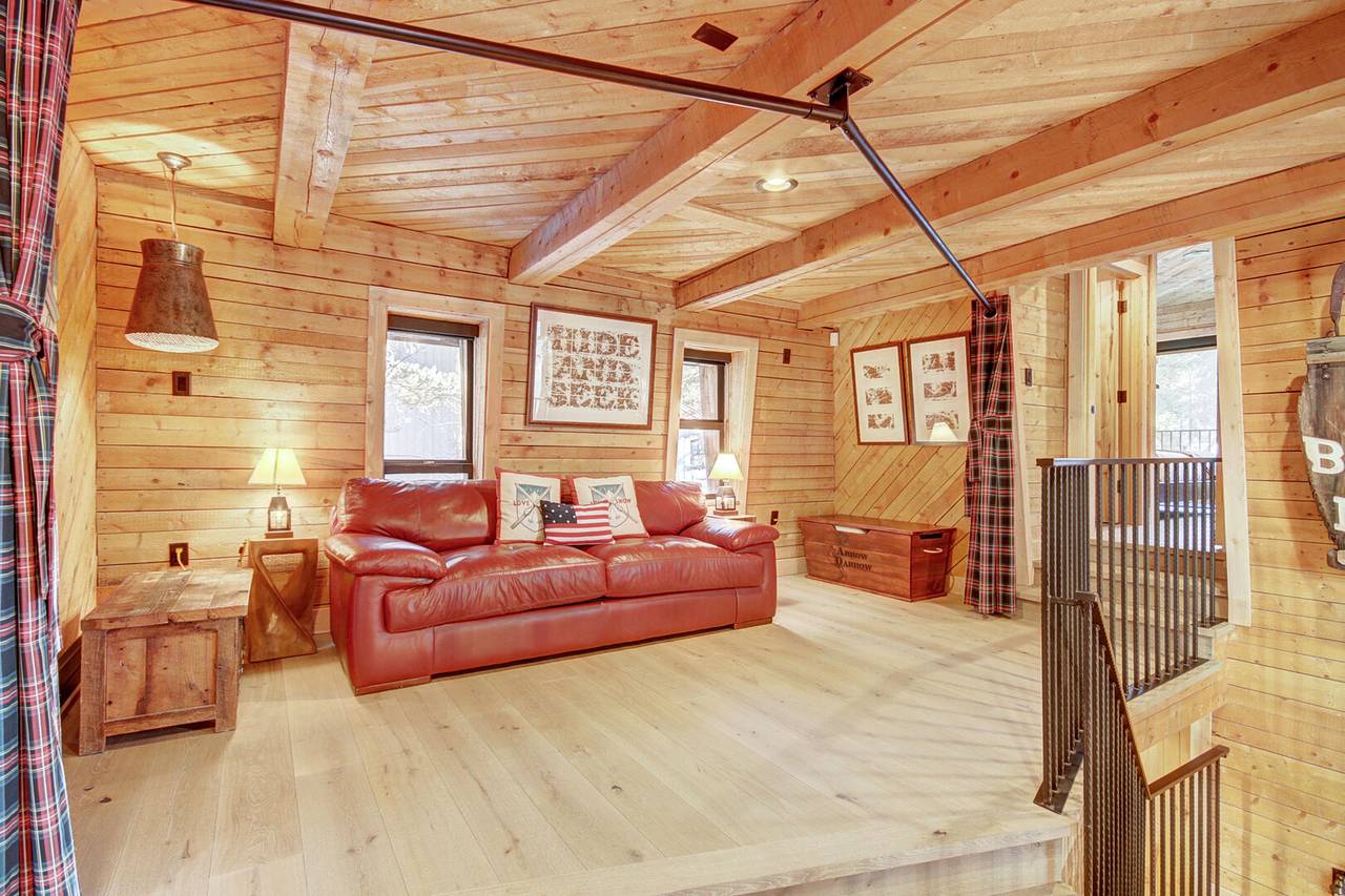 Upper level family room showing sleeper sofa with privacy curtain - Arrow Darrow Breckenridge Vacation Rental Upper level family room showing sleeper sofa with privacy curtain - Arrow Darrow Breckenridge Vacation Rental