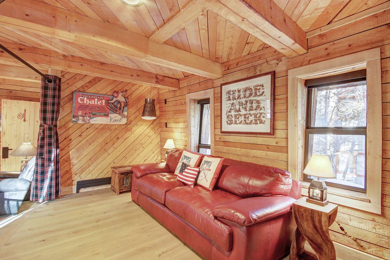 Upper level family room showing sleeper sofa with privacy curtain - Arrow Darrow Breckenridge Vacation Rental Upper level family room showing sleeper sofa with privacy curtain - Arrow Darrow Breckenridge Vacation Rental