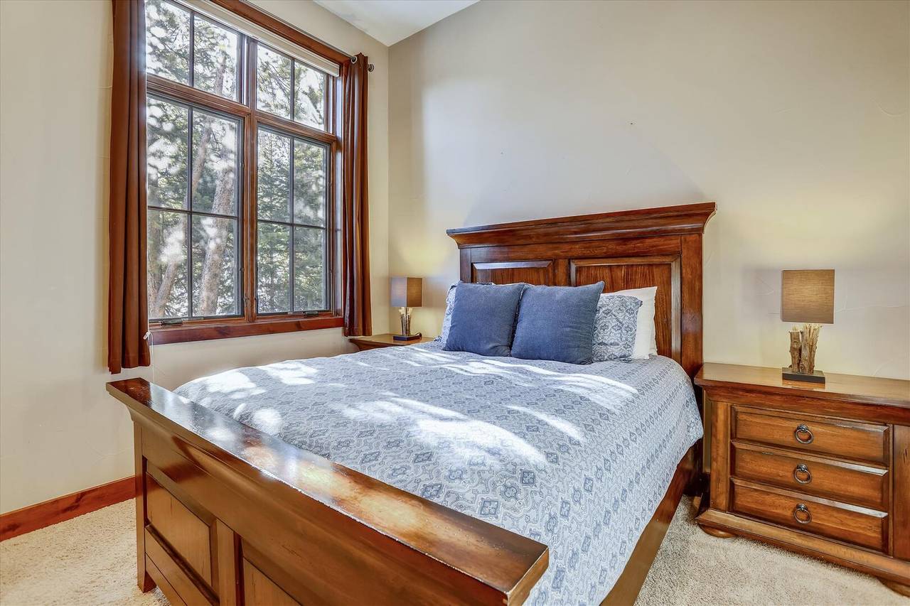 Lower level queen bedroom with private bathroom - Baldy Mountain Overlook Breckenridge Vacation Rental Lower level queen bedroom with private bathroom - Baldy Mountain Overlook Breckenridge Vacation Rental