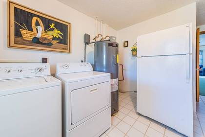 Laundry Area & Extra Refrigerator