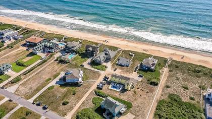 One row back from the beach!