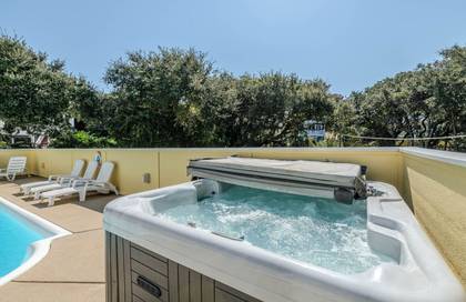 Relax in the Hot Tub next to the Pool