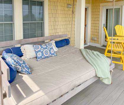 Enjoy ocean views from the mid level deck on this glorious hangi