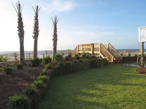 Beautiful landscaped yard steps from the sand & surf! Beautiful landscaped yard steps from the sand & surf!