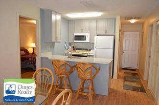 View of Entry and Kitchen View of Entry and Kitchen