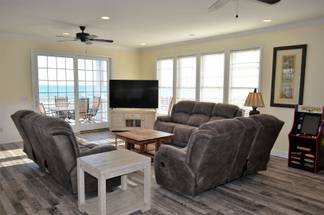 Watch TV or the ocean waves. Watch TV or the ocean waves.