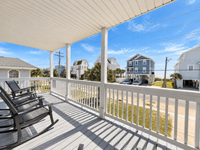 Step out onto the large covered porch. Step out onto the large covered porch.