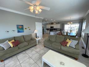 Down living/dining/kitchen area Down living/dining/kitchen area