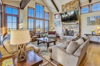 Your group can take in the mountain views or a show in this cozy living room - Baldy Mountain Overlook Breckenridge Vacation Rental Your group can take in the mountain views or a show in this cozy living room - Baldy Mountain Overlook Breckenridge Vacation Rental